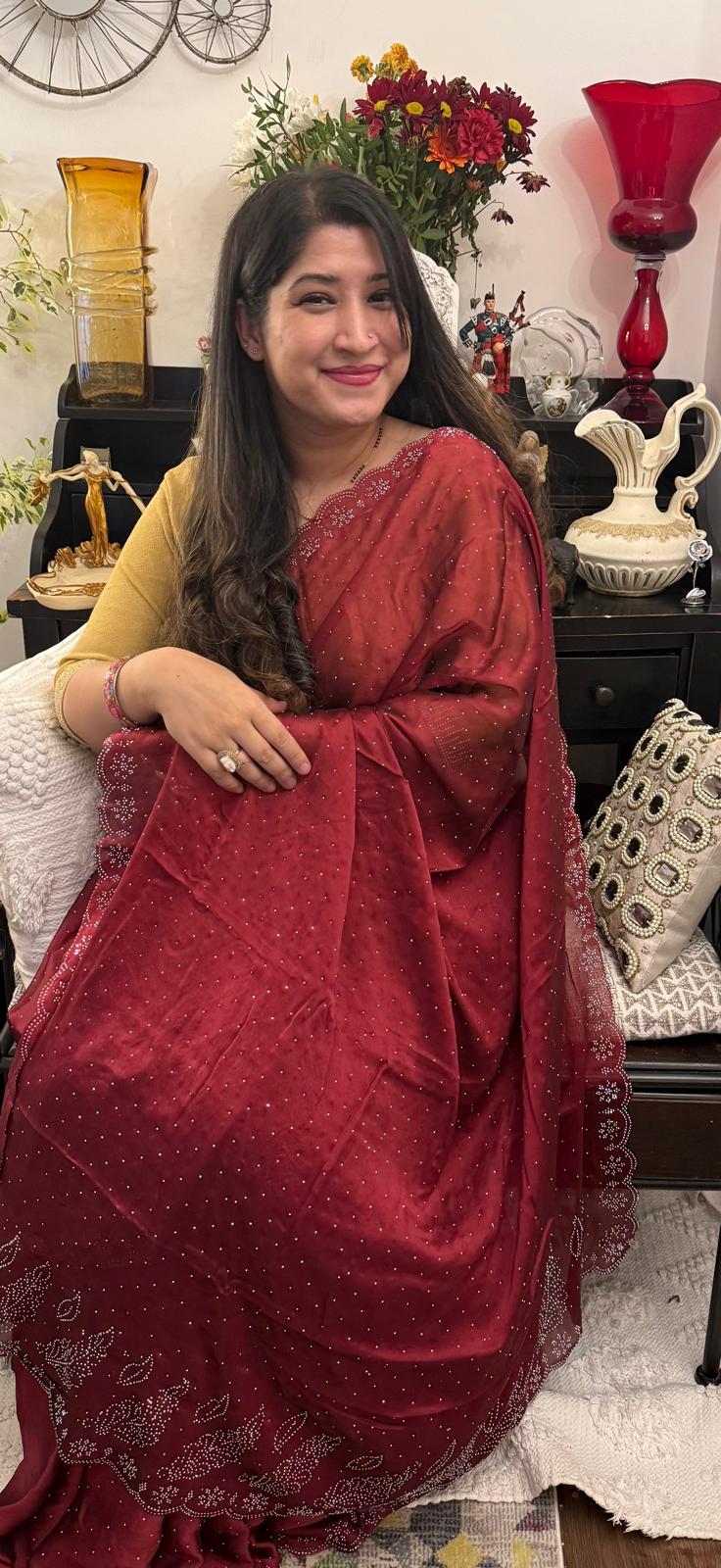 Deep red chiffon with siroski work.Colour of emotions and love. Beautiful and light £55