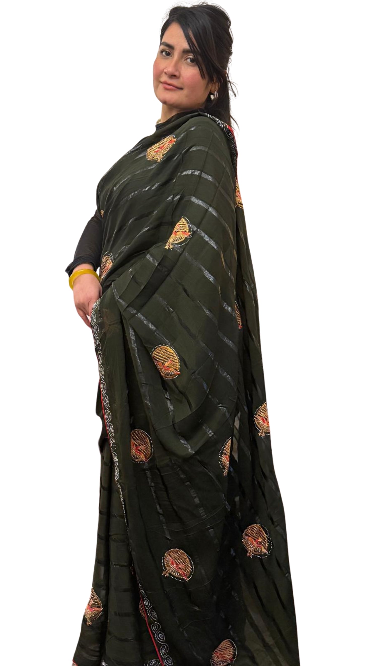 This army green silk chiffon blend saree is light, airy and effortlessly stylish,featuring fine horizontal lines and charming embroidered motifs.A balance of modern chic and timeless elegance £55