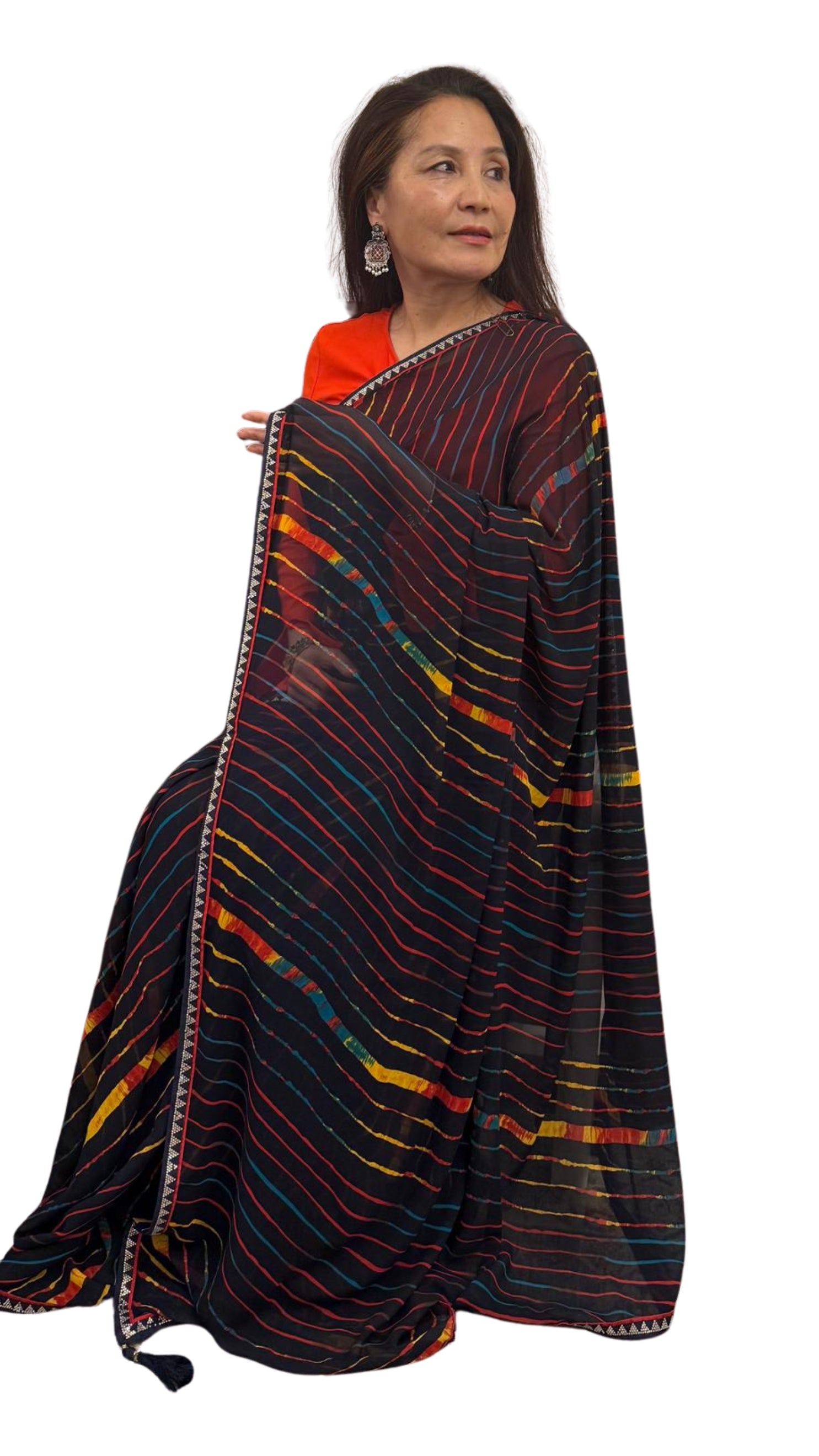 A navy blue backdrop highlighted with crosswise stripes in red,yellow and blue.Exceptionally light weight. This saree blends comfort with understated elegance , creating a look that is effortlessly beautiful £35