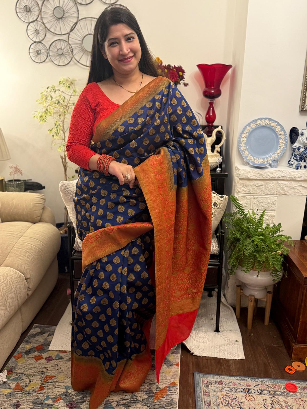 A raw silk sari in royal blue with beautiful motifs in zarikari. A combination of red and blue makes this saree  elegant and vibrant at the same time £70