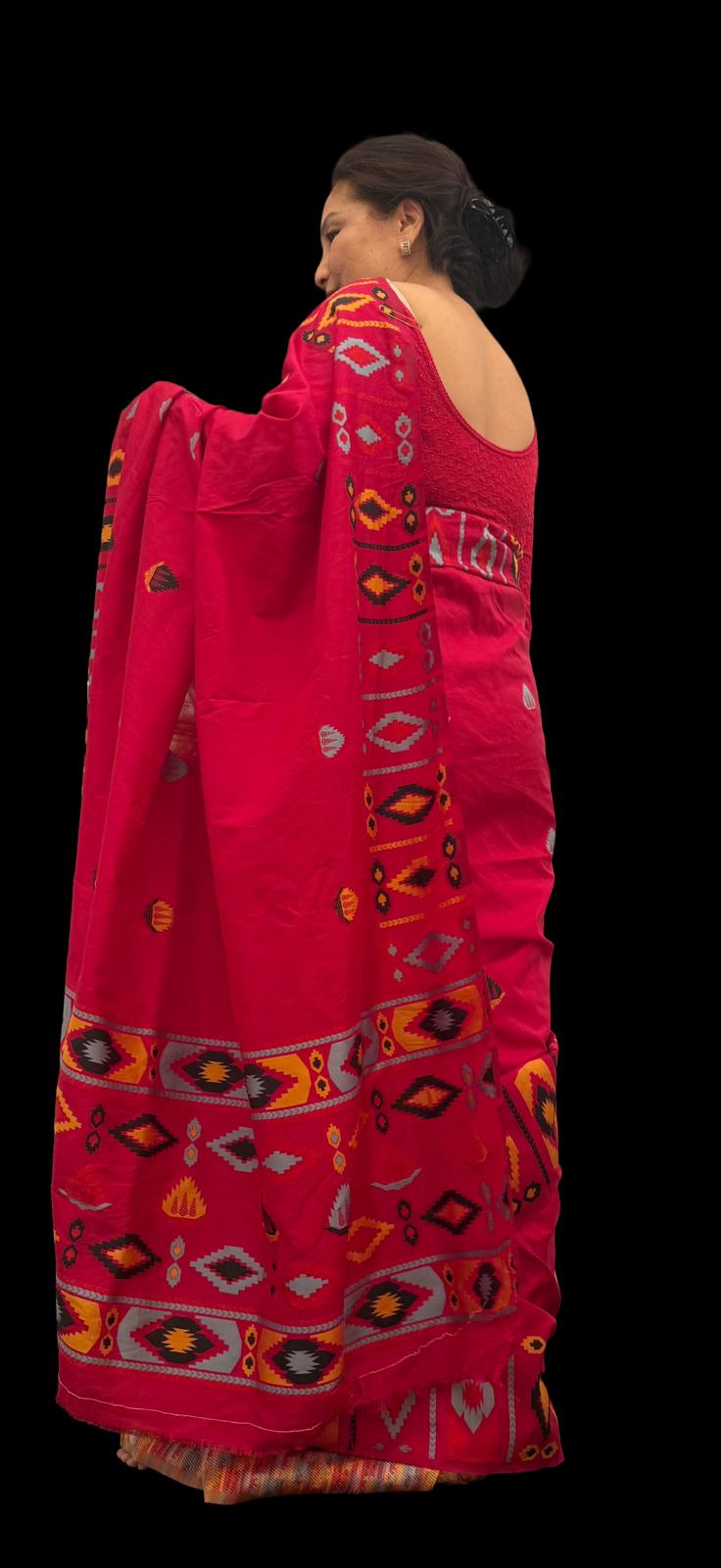 A hot pink raw silk saree featuring subtle geometrical patterns in the traditional Dhaka print, showcasing timeless craftsmanship with a contemporary appeal £70