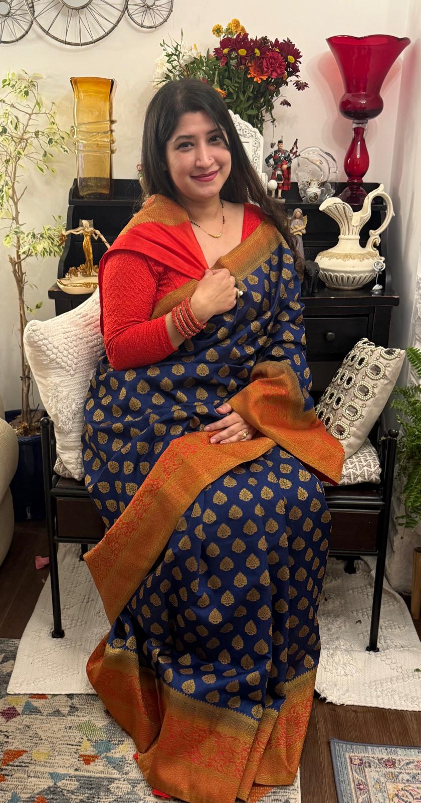 A raw silk sari in royal blue with beautiful motifs in zarikari. A combination of red and blue makes this saree  elegant and vibrant at the same time £70