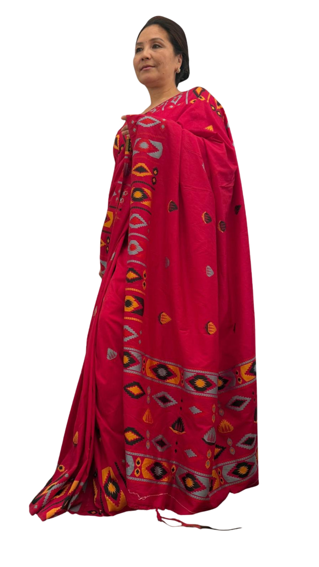 A hot pink raw silk saree featuring subtle geometrical patterns in the traditional Dhaka print, showcasing timeless craftsmanship with a contemporary appeal £70