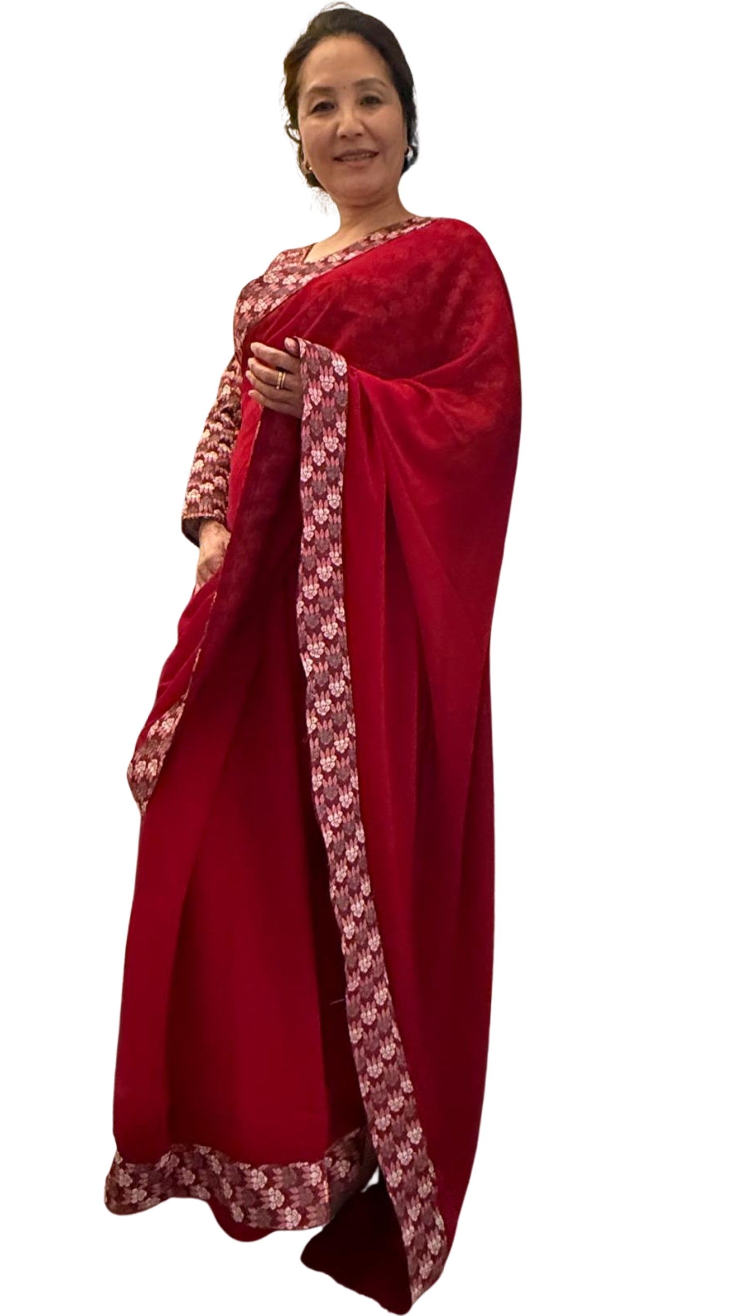 Lipstick red plain Dhaka print saree, beautifully embellished with authentic Nepali Dhaka print work along the border,enhancing its charm and grace. £135
