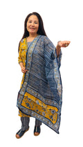 A pure cotton salwar suit in a graceful combination of warm amber and soothing shades of blue £40