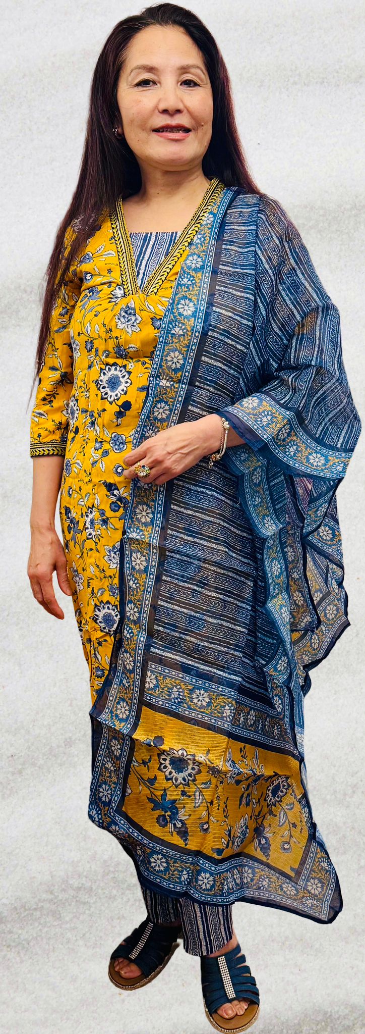 A pure cotton salwar suit in a graceful combination of warm amber and soothing shades of blue £40