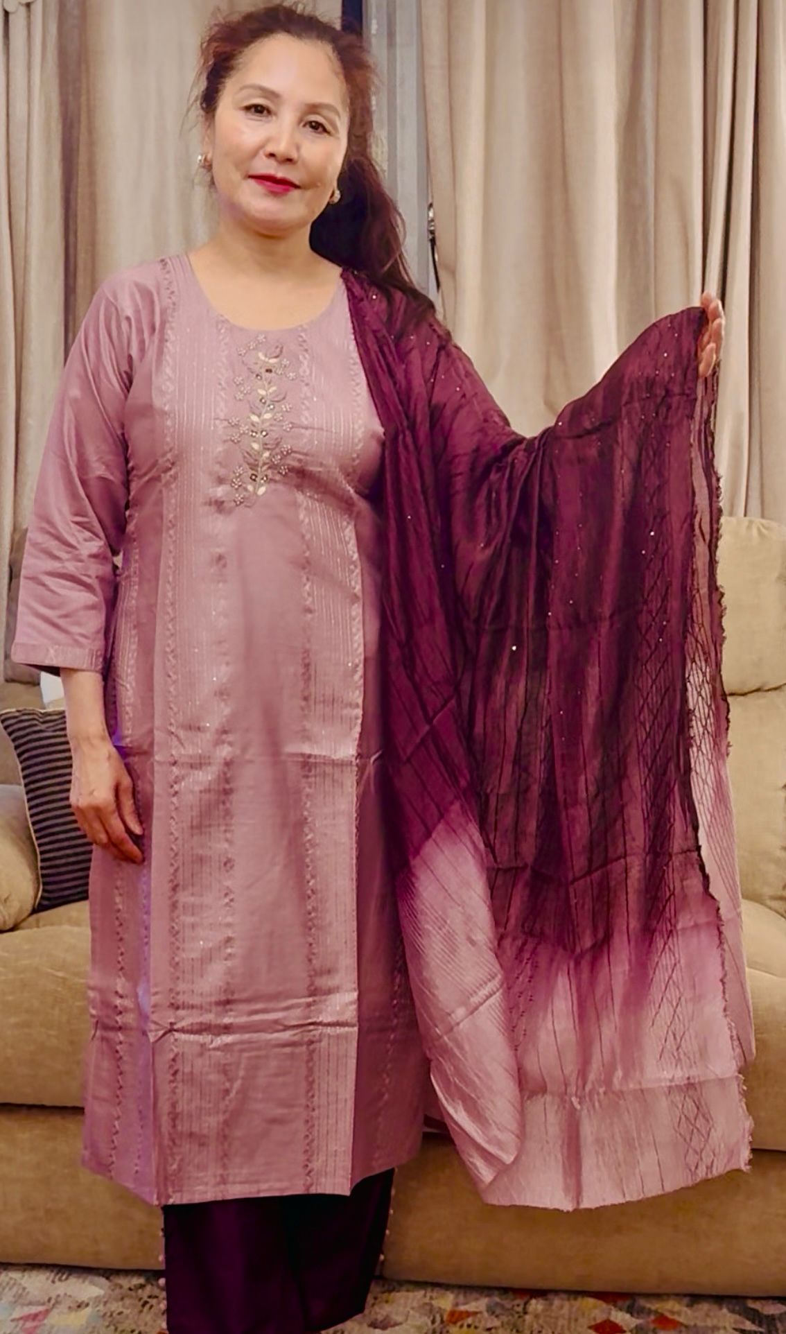 A graceful silk suit in a beautiful blend of soft heather and rich cheery tones. £50