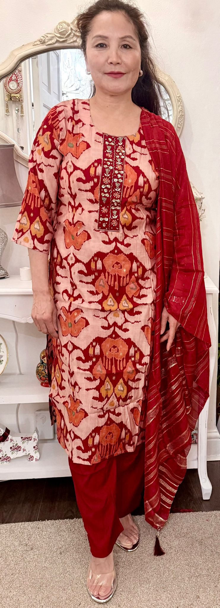 In rich cherry red damask linen, this ensemble radiates vibrant beauty and timeless elegance.The bold hue carries a spark of Divine allure. £45