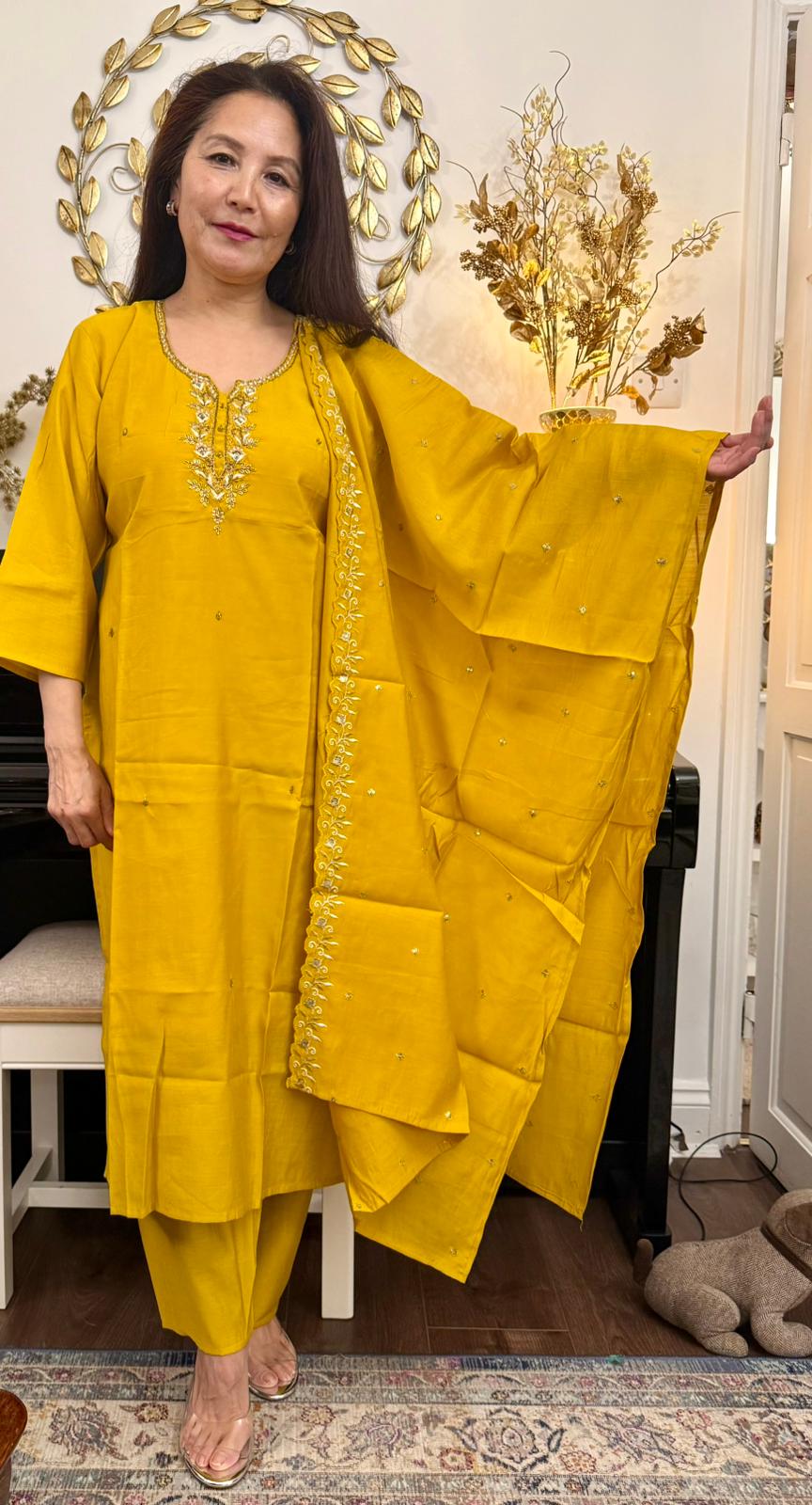 Bath in a golden glow, this ensemble reflects the brilliance of sunshine-bright,graceful and beautifully refined .£21.99