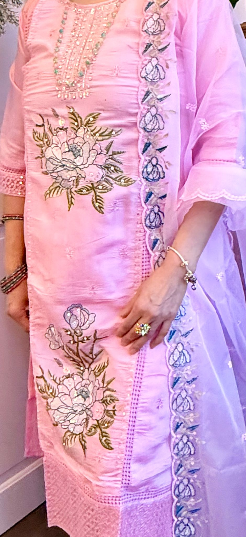 Crafted in rich blush pink silk and detailed with exquisite embroidery, this ensemble represents refined sophistication. The lightweight tissue shawl enhances the look with its delicate shine,creating a harmonious blend of elegance and feminine grace. £45