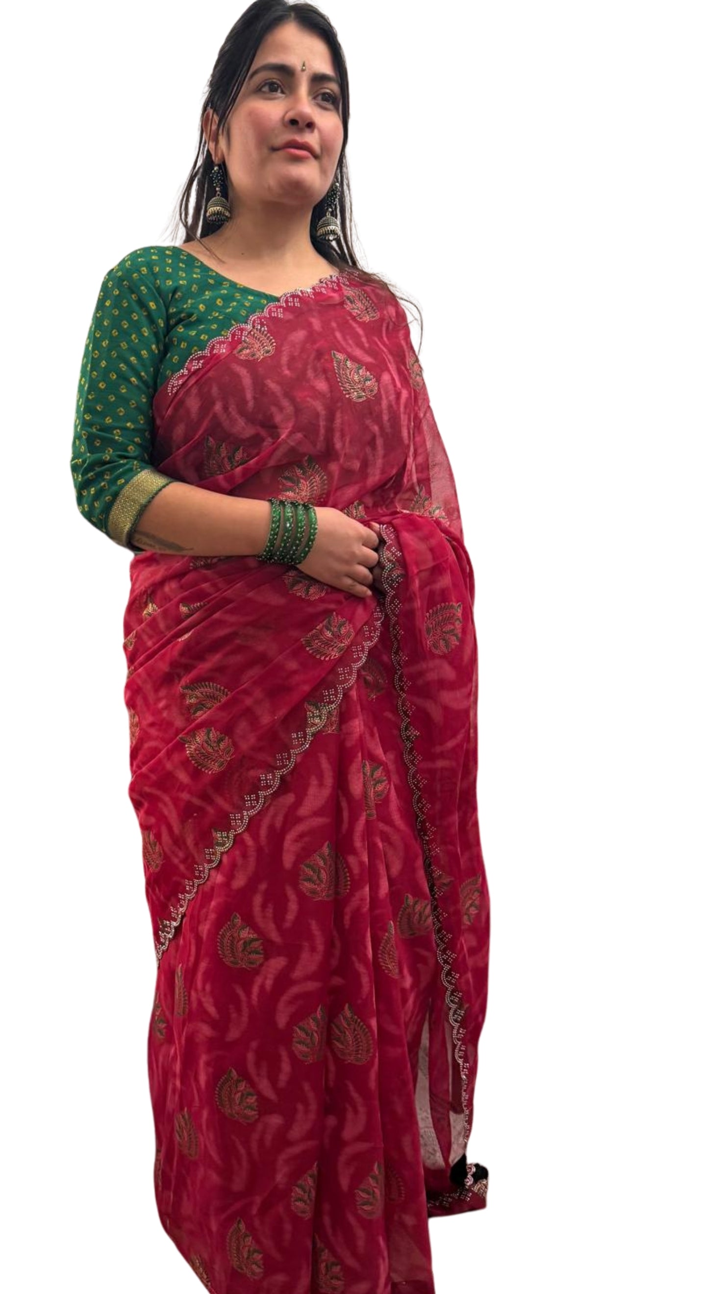 A beautiful cotton saree in a rich raspberry red hue,featuring delicate hand- painted motifs scattered gracefully across the fabric £30