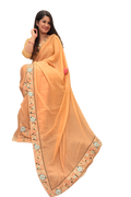 Peach satin ciffon, with embroidered border £55