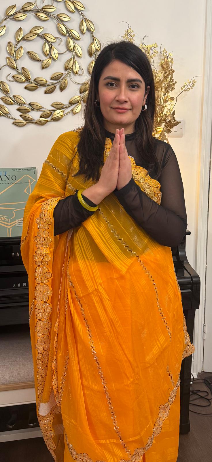 A Saree with soft chiffon drenched in mango - turmeric hues £45