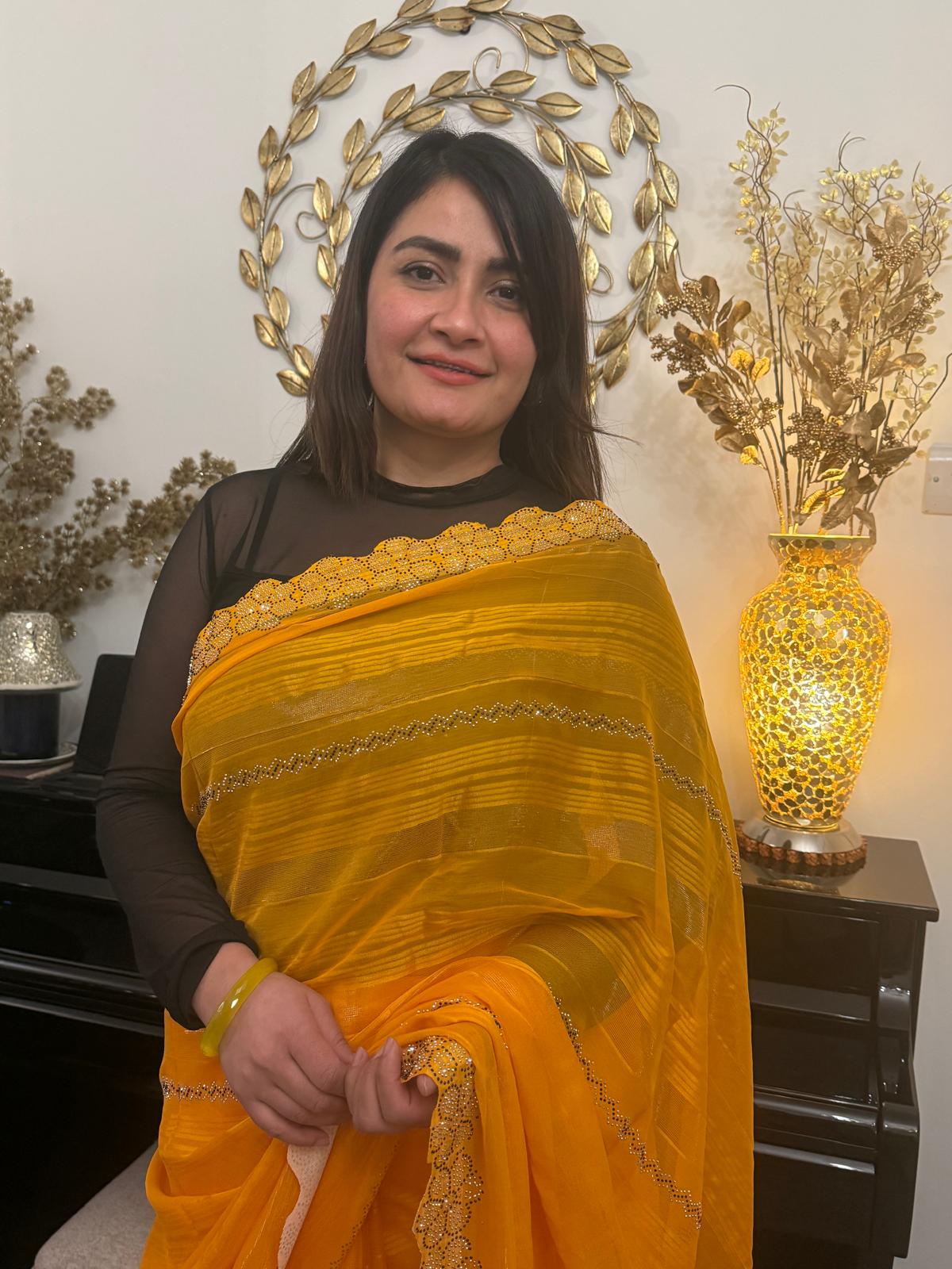 A Saree with soft chiffon drenched in mango - turmeric hues £45