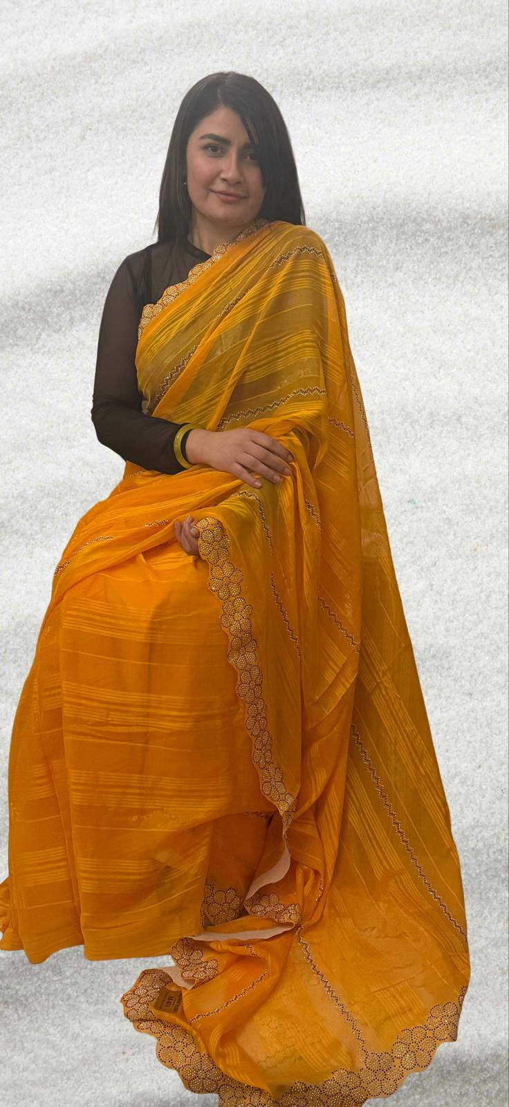 A Saree with soft chiffon drenched in mango - turmeric hues £45